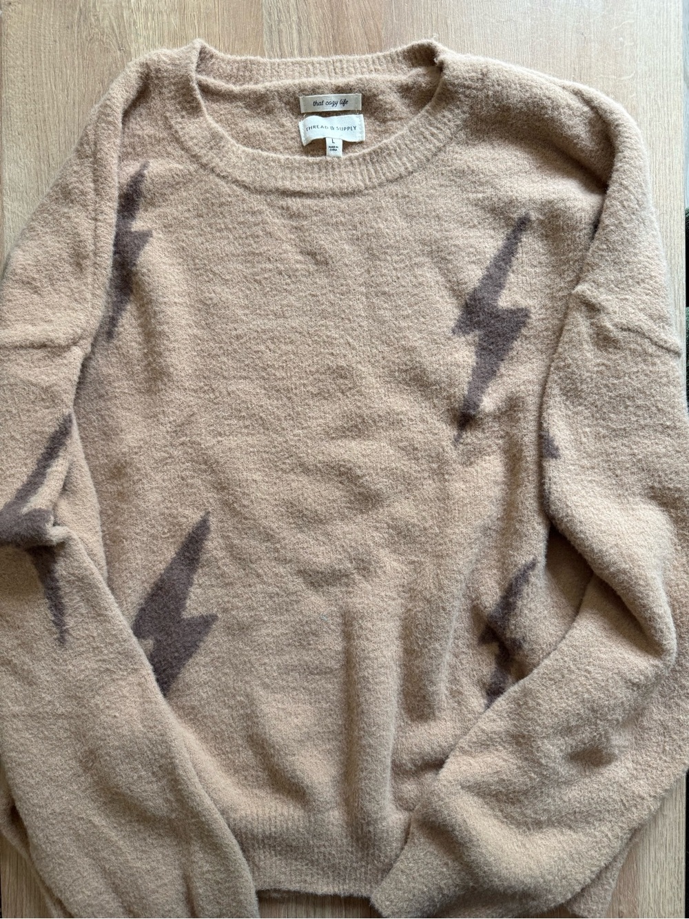 Thread & Supply Beige Crewneck Sweater with Brown Lightning Accents